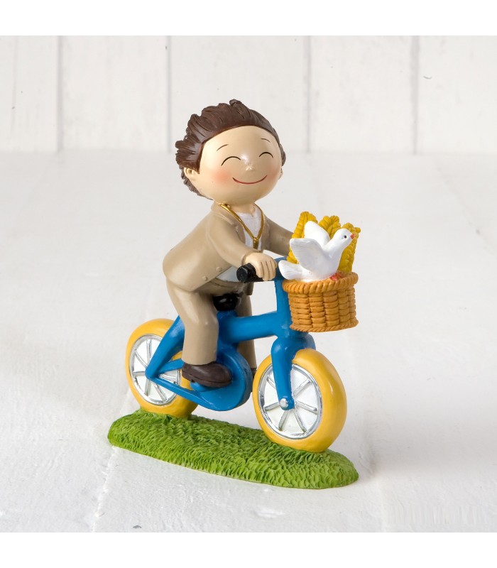 Figura pastel Niño Comunión en bicicleta